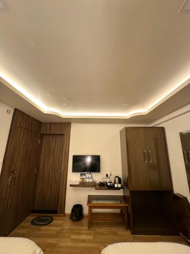 Fratelli Guest Houseにあるテレビまたはエンターテインメントセンター