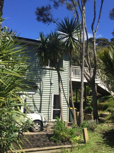 a house with a car parked in front of it at memory in Auckland