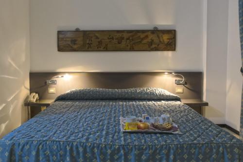 Кровать или кровати в номере Verdemilia Hotel