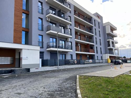 an empty street in front of a building at Premium Apartament & Spa in Zator