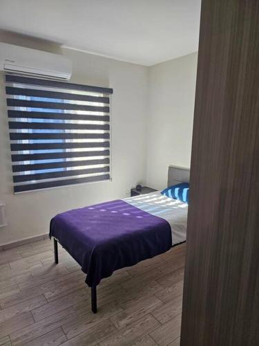 Postel nebo postele na pokoji v ubytování Estilo urbano: Depa. en el Corazón de la Ciudad