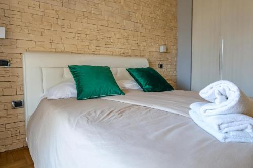 Ένα ή περισσότερα κρεβάτια σε δωμάτιο στο Villa Elisabetta