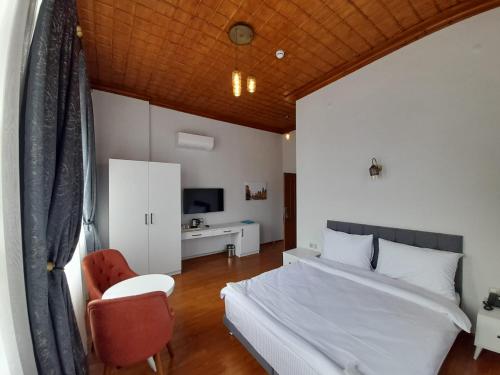 Postel nebo postele na pokoji v ubytování VE HOTELS KAPADOKYA