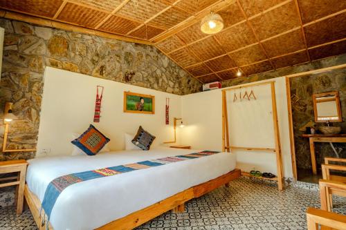 Letto o letti in una camera di Sapa Eco Bungalows & Spa