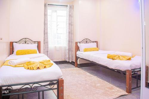 Ένα ή περισσότερα κρεβάτια σε δωμάτιο στο The Furnished Homes KE, Lake View & GYM
