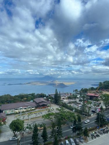 an aerial view of a town with a parking lot at Lake View Wind SMDC Tagaytay in Tagaytay
