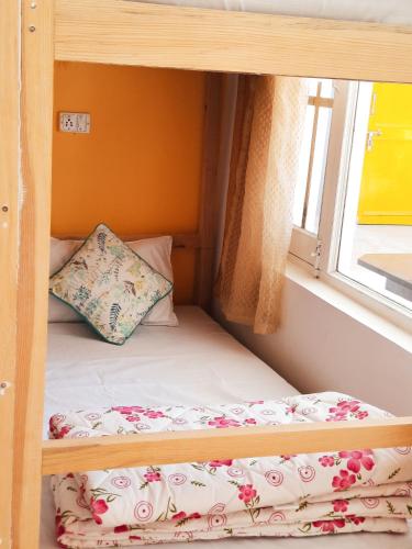 Cama o camas de una habitación en Be Happy HomeStay