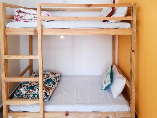 Cama o camas de una habitación en Be Happy HomeStay