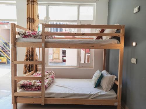 Cama o camas de una habitación en Be Happy HomeStay