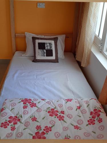 Cama o camas de una habitación en Be Happy HomeStay