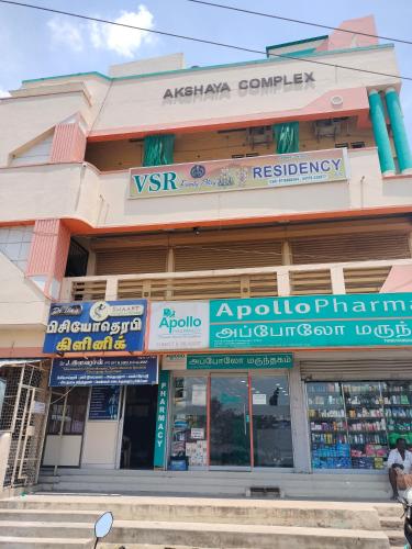 a store front of a building with signs on it at VSR Residency A/C ( Family stay ) in Tiruvannāmalai