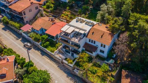 an overhead view of a large house with orange roof at Nakas Suites in Fethiye