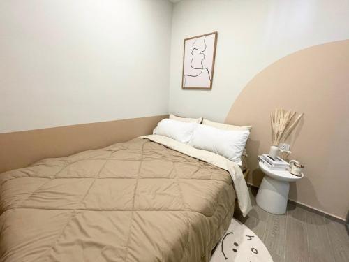 Кровать или кровати в номере MeoMeo Homestay - The Sóng Apartment