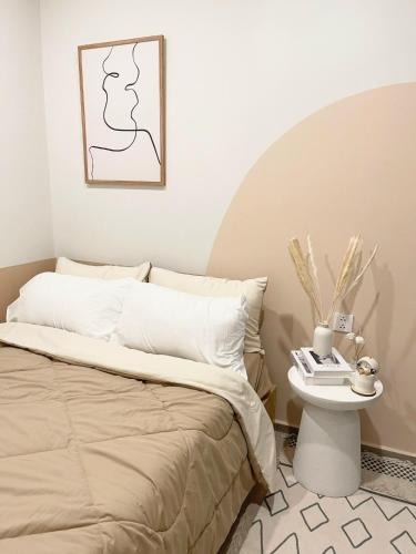 Кровать или кровати в номере MeoMeo Homestay - The Sóng Apartment