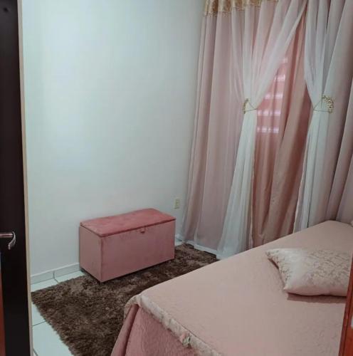 Katil atau katil-katil dalam bilik di Aluguel de casa para diaria