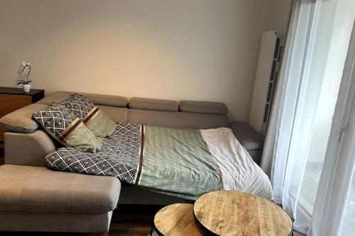 Een bed of bedden in een kamer bij 2024 Olympics - 20 min de Paris