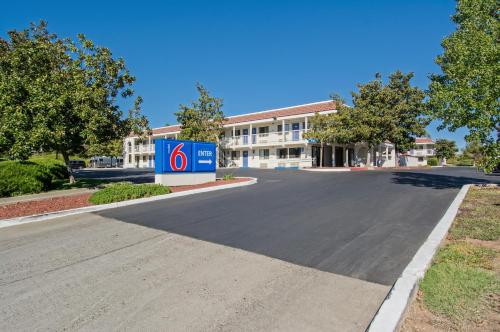 an empty street in front of a building at Motel 6-Redding, CA - South in Redding