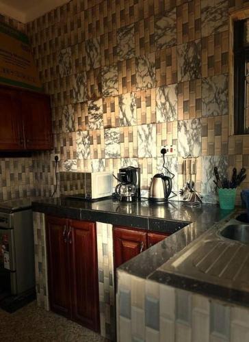 Kuchyň nebo kuchyňský kout v ubytování Chayil Loft Mulago