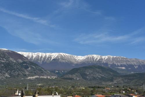 a view of a mountain range with snow covered mountains at O' Frechete! in Sulmona