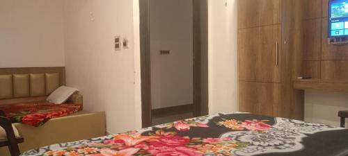 Krevet ili kreveti u jedinici u objektu Hotel Ganges Pride