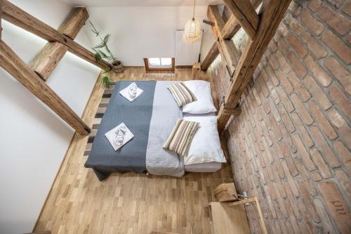 Postel nebo postele na pokoji v ubytování Apartmány Marienhof