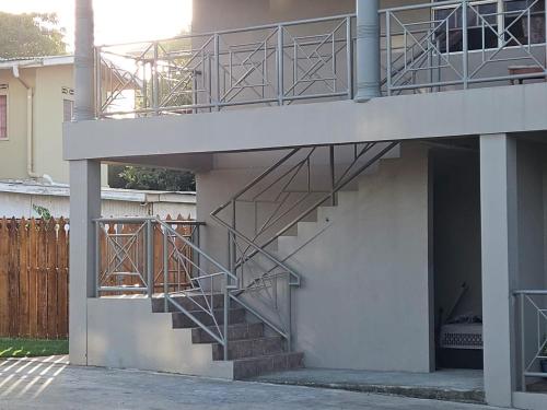 a metal staircase on the side of a building at Cozy one bedroom apartment in Lambeau