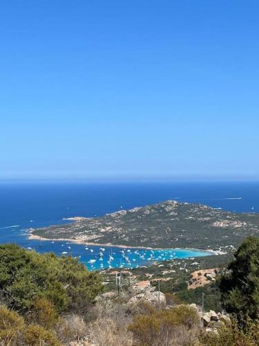 a view of an island in the ocean at Casa Gió Grazioso Appartamento a Porto Cervo in Liscia di Vacca