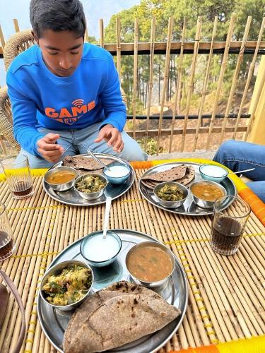 ゲストハウスの敷地内または近くでの食事または食べ物