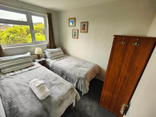 מיטה או מיטות בחדר ב-Haydon Hill House