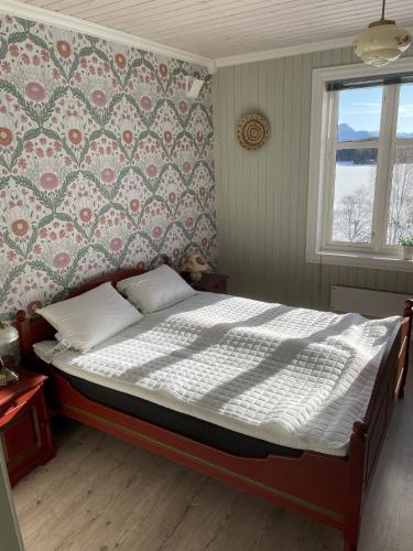 A bed or beds in a room at Villa Hegeland
