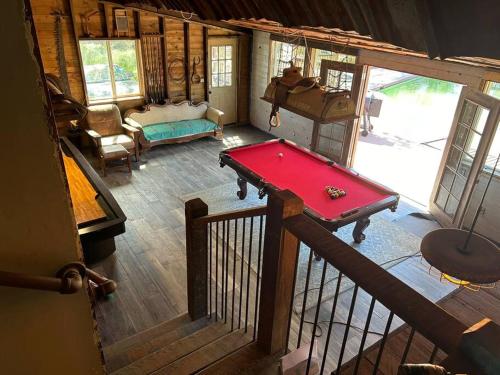 an overhead view of a room with a pool table at Bonanza Barn Retreat in Loomis