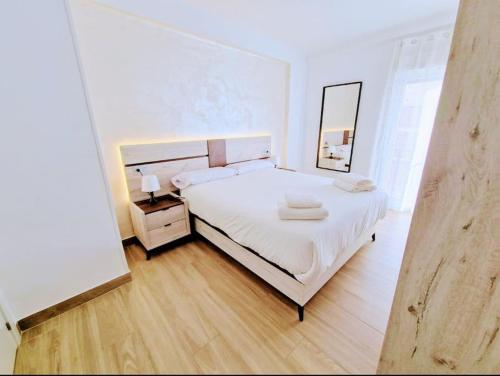 Posteľ alebo postele v izbe v ubytovaní Apartamento Puerto Sol y Mar