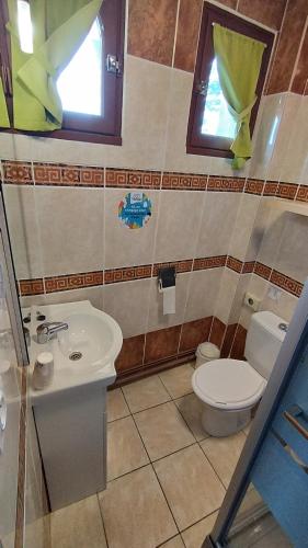 Bilik mandi di Résidence L'Ogomé