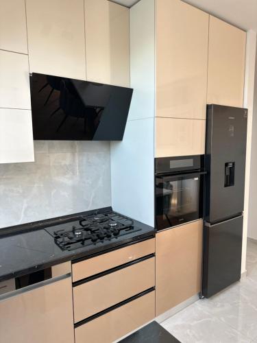 Kuchyň nebo kuchyňský kout v ubytování Apartman “Manhattan”