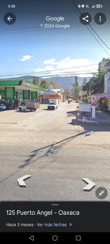 une photo d'une rue vide avec des flèches dans la rue dans l'établissement T, à San Agustin de las Juntas