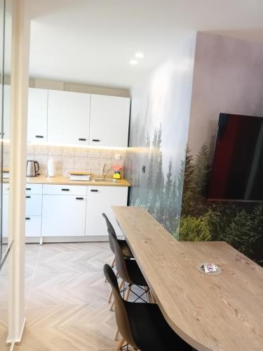 Kuchyň nebo kuchyňský kout v ubytování Amber's home
