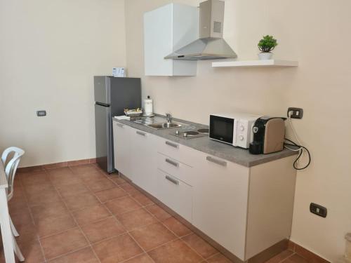 Η κουζίνα ή μικρή κουζίνα στο B&B Genti delle Alture