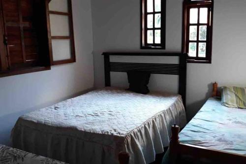 Krevet ili kreveti u jedinici u okviru objekta Casa para toda a família próximo ao centro de Paty do Alferes e Miguel Pereira