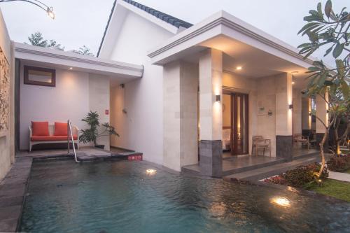 Πισίνα στο ή κοντά στο The Cozy Haven Sanur