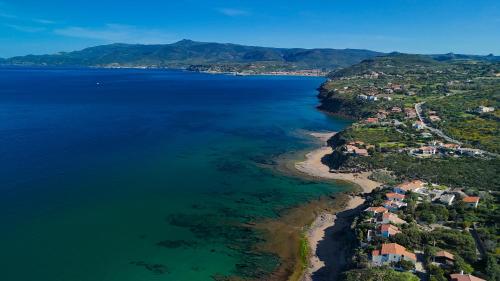 an aerial view of a beach and the ocean at Welcomely - Badde Nuraghe dimora vista mare con parcheggio privato in Magomadas