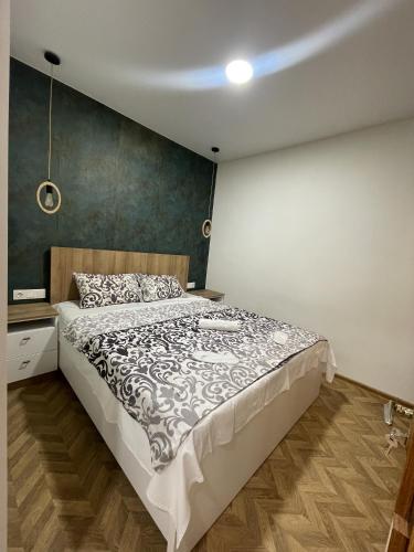 Postel nebo postele na pokoji v ubytování Modern studio in the city center