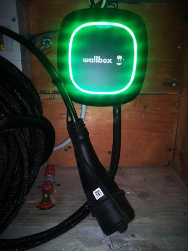 a green tv with a cord hooked up to it at B&B Tonnarella Beach in Torre Forte