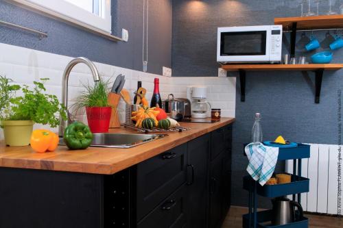 Η κουζίνα ή μικρή κουζίνα στο gite du vieux saule 1 gite avec spa privatif pour 2 personnes 1 suite familiale sans spa