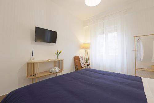 Postel nebo postele na pokoji v ubytování La casa di Franca: Agrigento centro