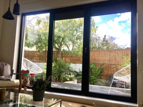 Imagen de la galería de Maison lumineuse de 100m2 avec jardin et parking., en Nanterre