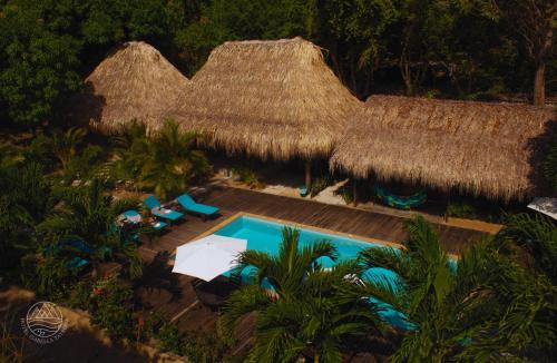 an aerial view of a resort with a swimming pool at Hotel Isabella Tayrona in Los Naranjos