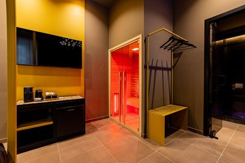 a bathroom with a walk in shower and a sink at GOLD SUITE&SPA in Palermo