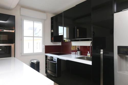 Dapur atau dapur kecil di Comfortable flat 15 min from Paris