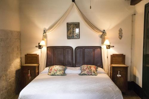 A bed or beds in a room at Masseria Cianciò