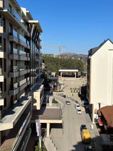 an aerial view of a city street with a building at Centar Jezero Zlatibor klimatizovano in Zlatibor